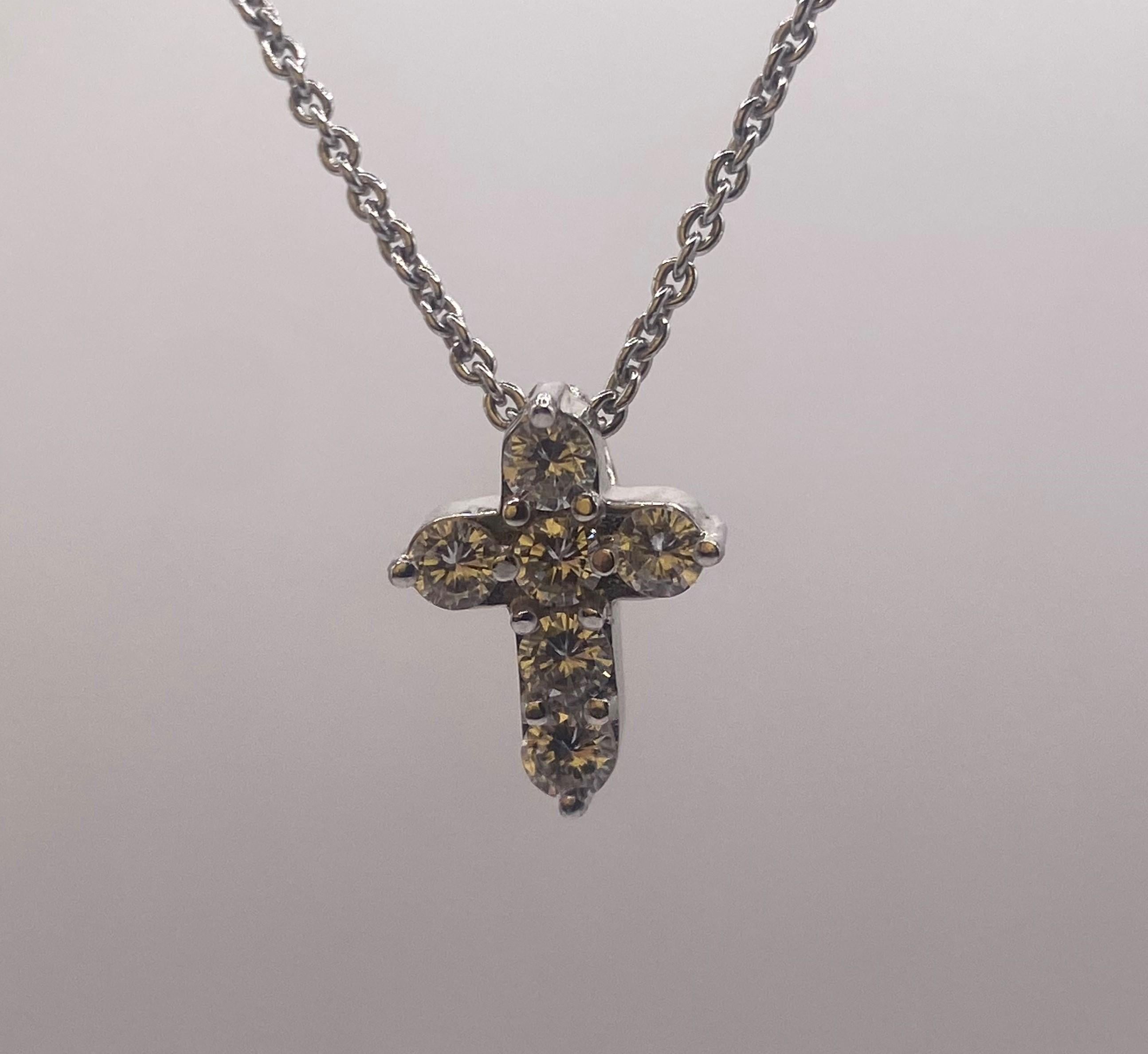 Modern 0.60ctw Round Diamond Cross Pendant in 18KT White Gold For Sale
