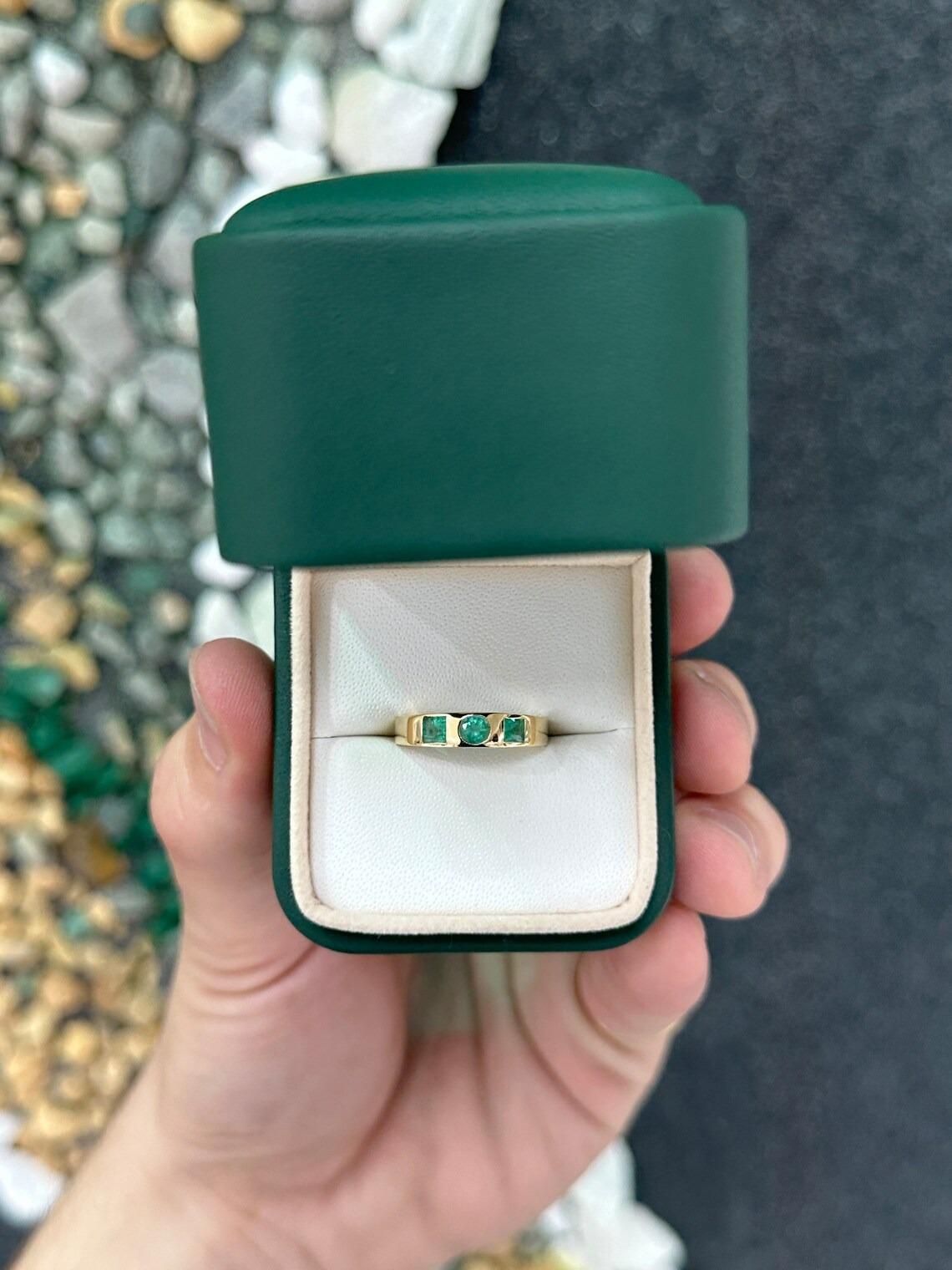 Round Cut 0.60tcw 14K Medium Green Round & Princess Cut Emerald Bezel Set Three Stone Band For Sale