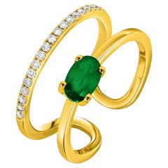 Bague en or jaune 18 carats avec diamants ronds et émeraudes de 0,61 carat