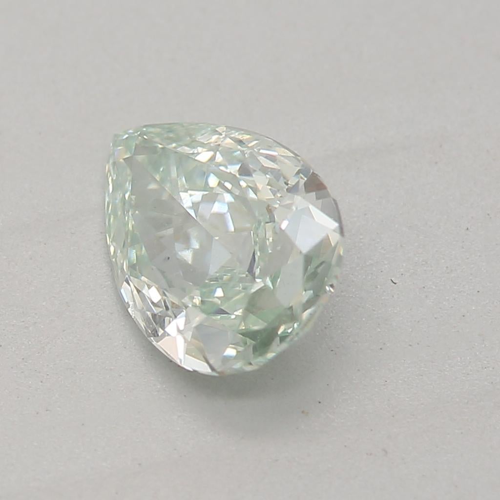 Pear Cut 0.61 Carat Fancy Bluish Green Pear cut diamond SI1 Clarity GIA Certified For Sale