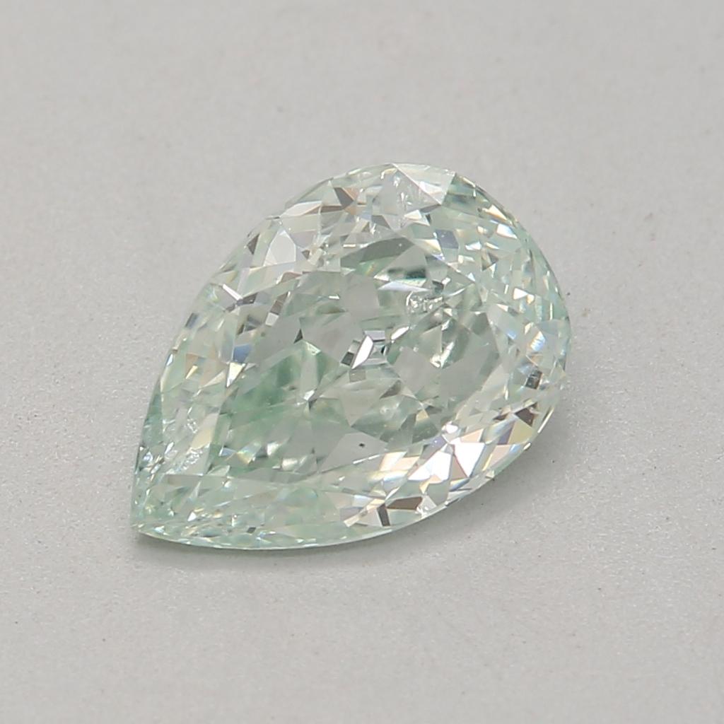 0.61 Carat Fancy Bluish Green Pear cut diamond SI1 Clarity GIA Certified For Sale 1