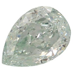 0.61 Carat Fancy Bluish Green Pear cut diamond SI1 Clarity GIA Certified