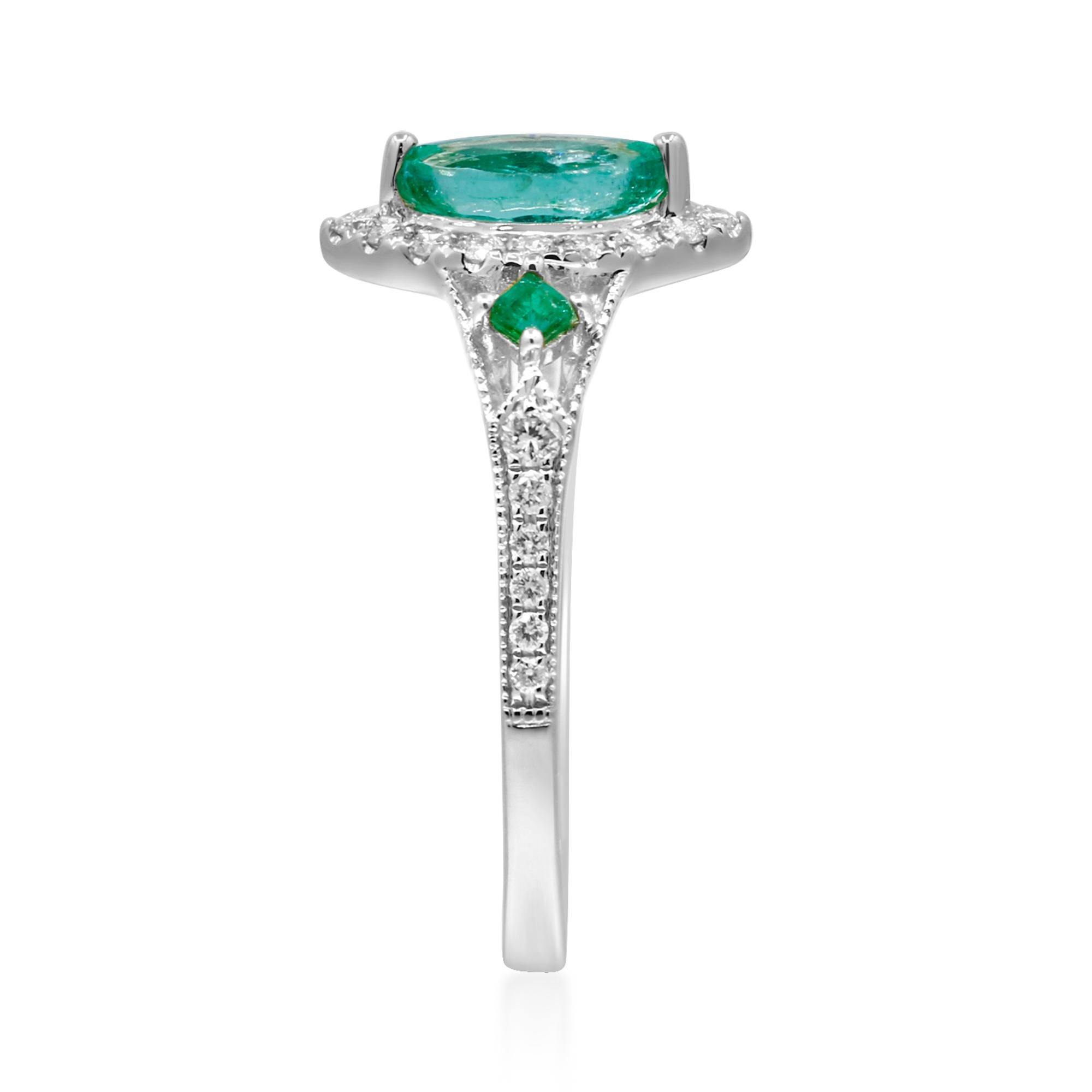 Decorate yourself in elegance with this Ring is crafted from 14-karat Yellow Gold by Gin & Grace. This Ring is made up of 8x4 mm Marquise-Cut Emerald (1 pcs) 0.51 carat, 2.0 mm Square-cut Emerald (2 pcs) 0.11 carat and Round-cut White Diamond (28
