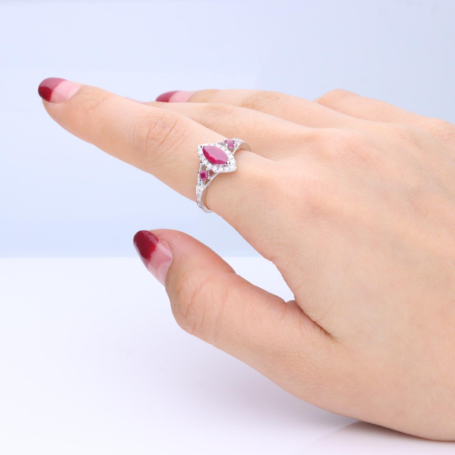 Decorate yourself in elegance with this Ring is crafted from 14-karat White Gold by Gin & Grace.This Ring is made up of 8x4 mm Marquise-Cut Ruby (1 pcs) 0.61 carat, 2.0 mm Square-cut Ruby (2 pcs) 0.12 carat and Round-cut White Diamond (28 Pcs) 0.25