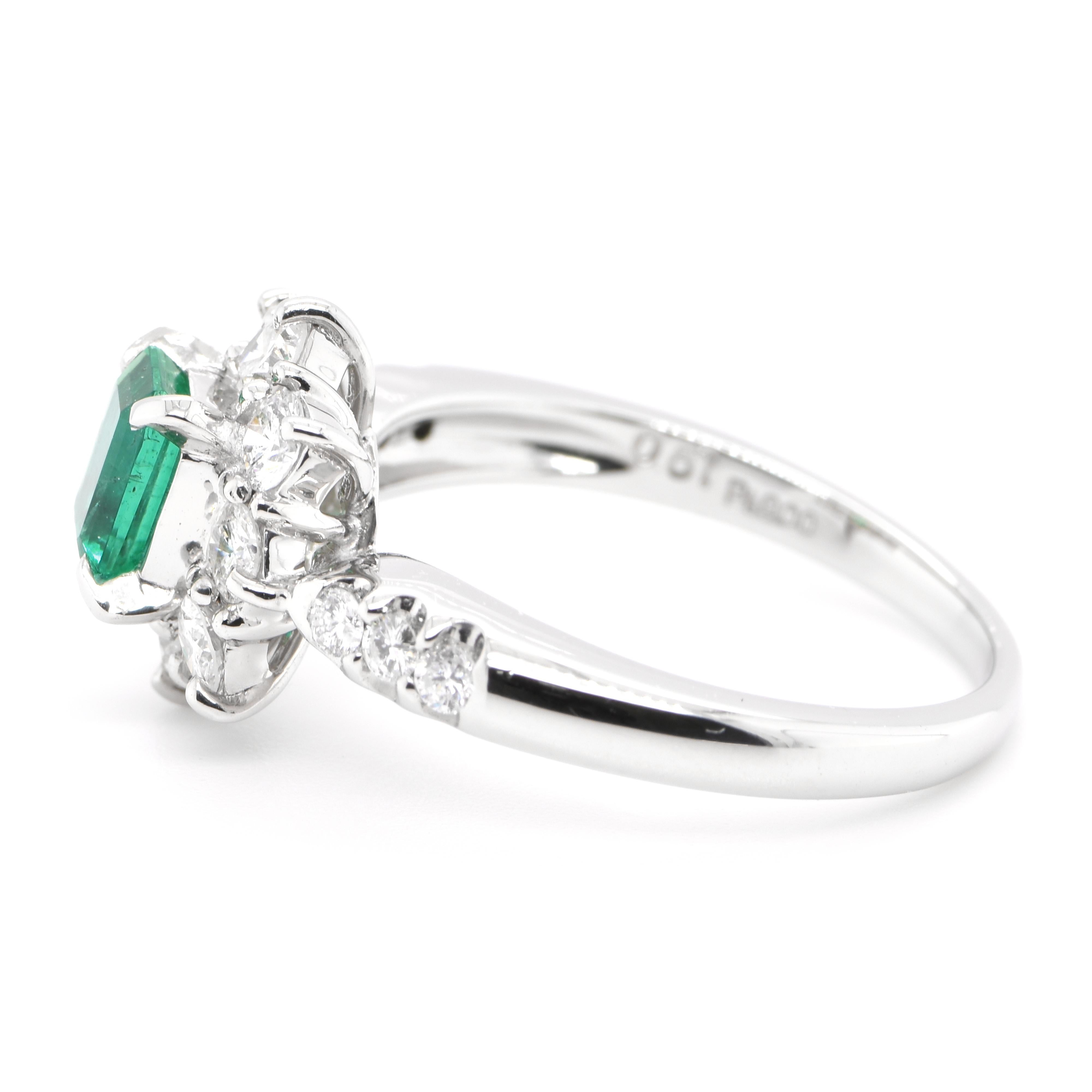 Emerald Cut 0.61 Carat Natural Emerald and Diamond Ring Set in Platinum