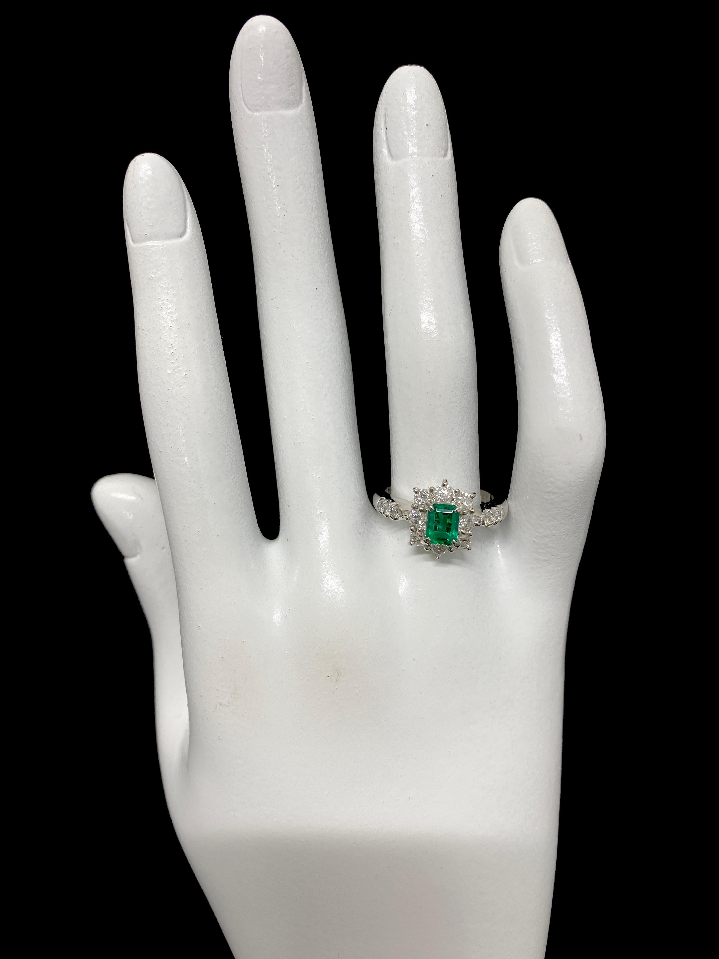 0.61 Carat Natural Emerald and Diamond Ring Set in Platinum 1