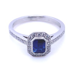 0.61 Carat Sapphire and Diamond Cluster Platinum Engagement Ring