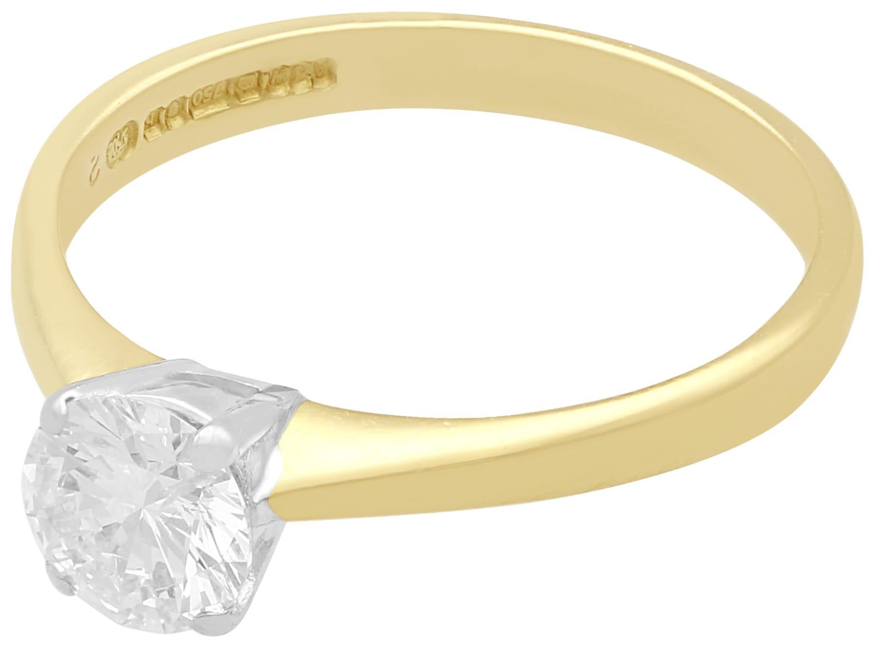 An impressive contemporary 0.61 carat diamond and 18 karat yellow gold, 18 karat white gold set solitaire ring; part of our diverse diamond jewelry collections.

This fine and impressive diamond solitaire ring has been crafted in 18k yellow gold