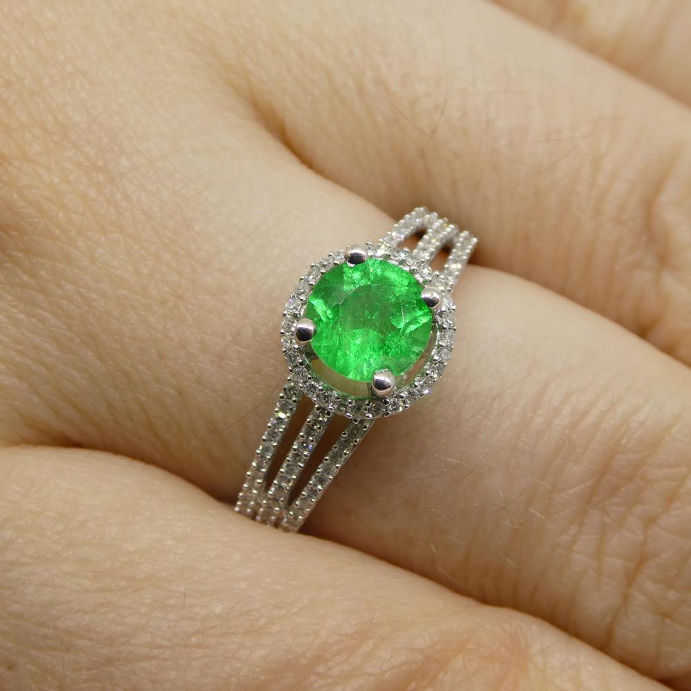 Introducing the breathtaking 0.61ct Emerald Diamond Statement or Engagement Ring, meticulously crafted and set in lustrous 14K white gold. Designed to captivate and inspire, this exquisite piece from Skyjems combines the timeless elegance of an