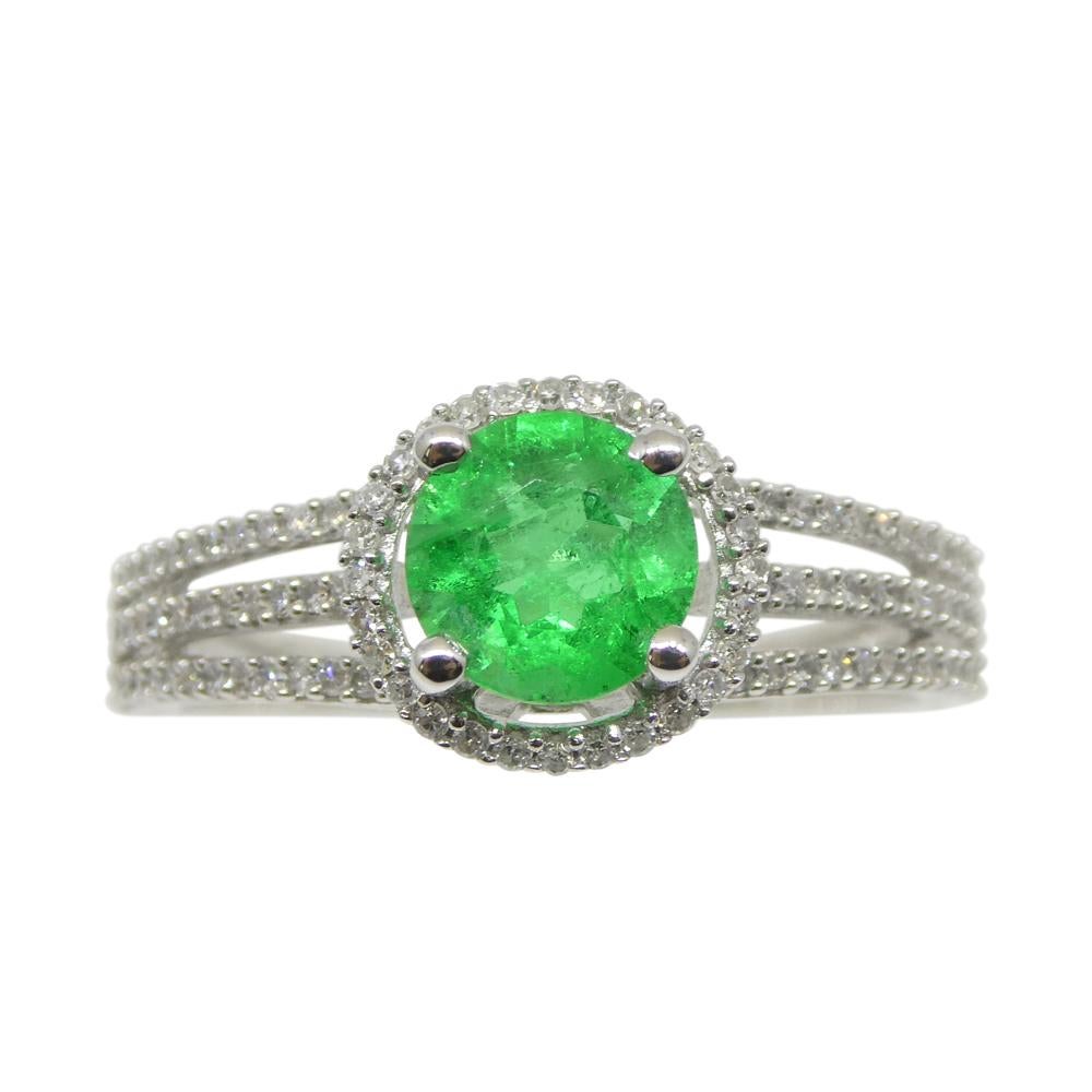 Contemporary 0.61ct Emerald, Diamond Statement or Engagement Ring set in 14k White Gold For Sale
