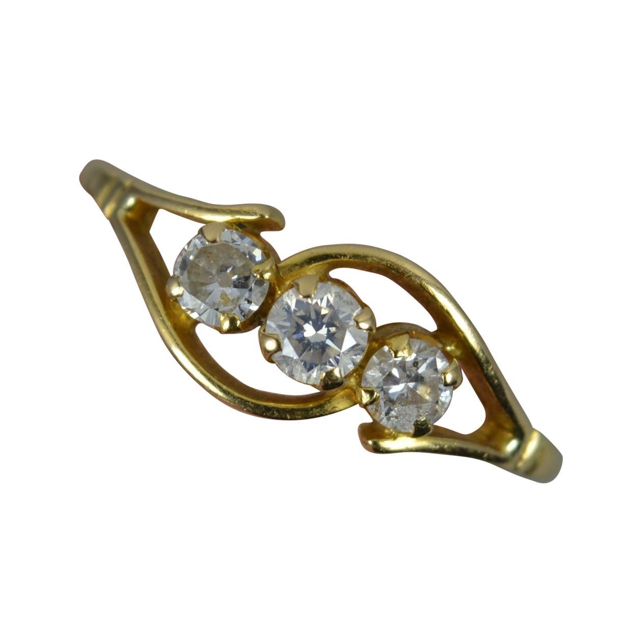 0.61ct Natural Diamond 18 Carat Gold Trilogy Ring on Twist For Sale