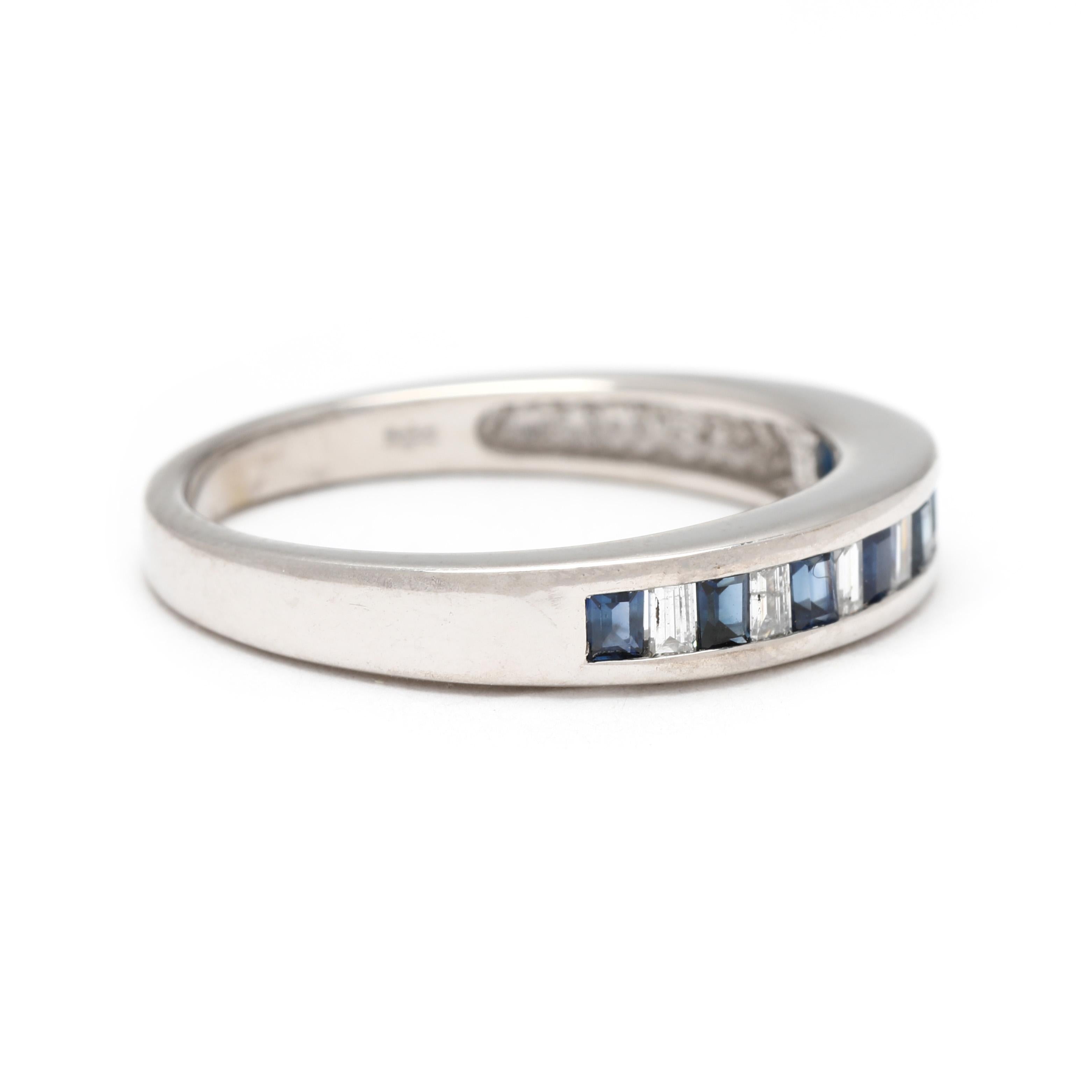 Steine:
Diamanten, 7 Steine
Baguetteschnitt
2 x 1.25 mm
etwa .20 Karat insgesamt
Farbe G-H, Reinheit SI1-I1
Saphire, 8 Steine
Baguetteschnitt
2 x 1,5 mm
etwa 0,40 Karat insgesamt

Ring Größe 7

Breite: 3,8 mm

Gewicht: 1,8 dwts. / 2,8