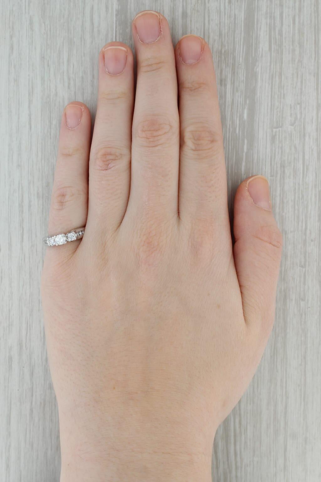 0.61ctw Round 3-Stone Diamond Engagement Ring 14k White Gold Size 7.25 2