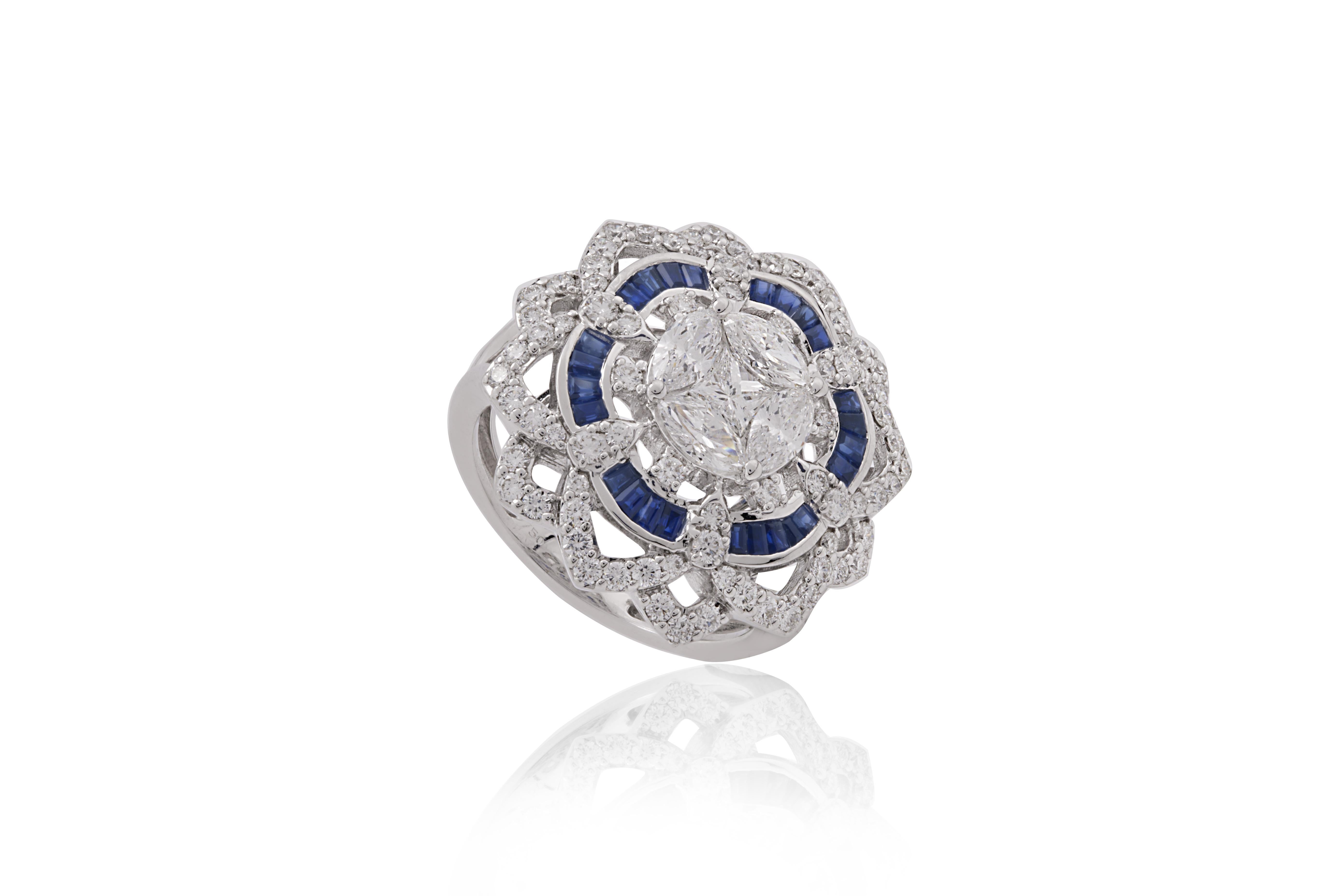 This exquisite ring is crafted from 18-karat white gold and features a stunning floral-inspired design, radiating elegance and sophistication. At its center, four marquise-cut diamonds are arranged in a symmetrical setting, forming a brilliant focal