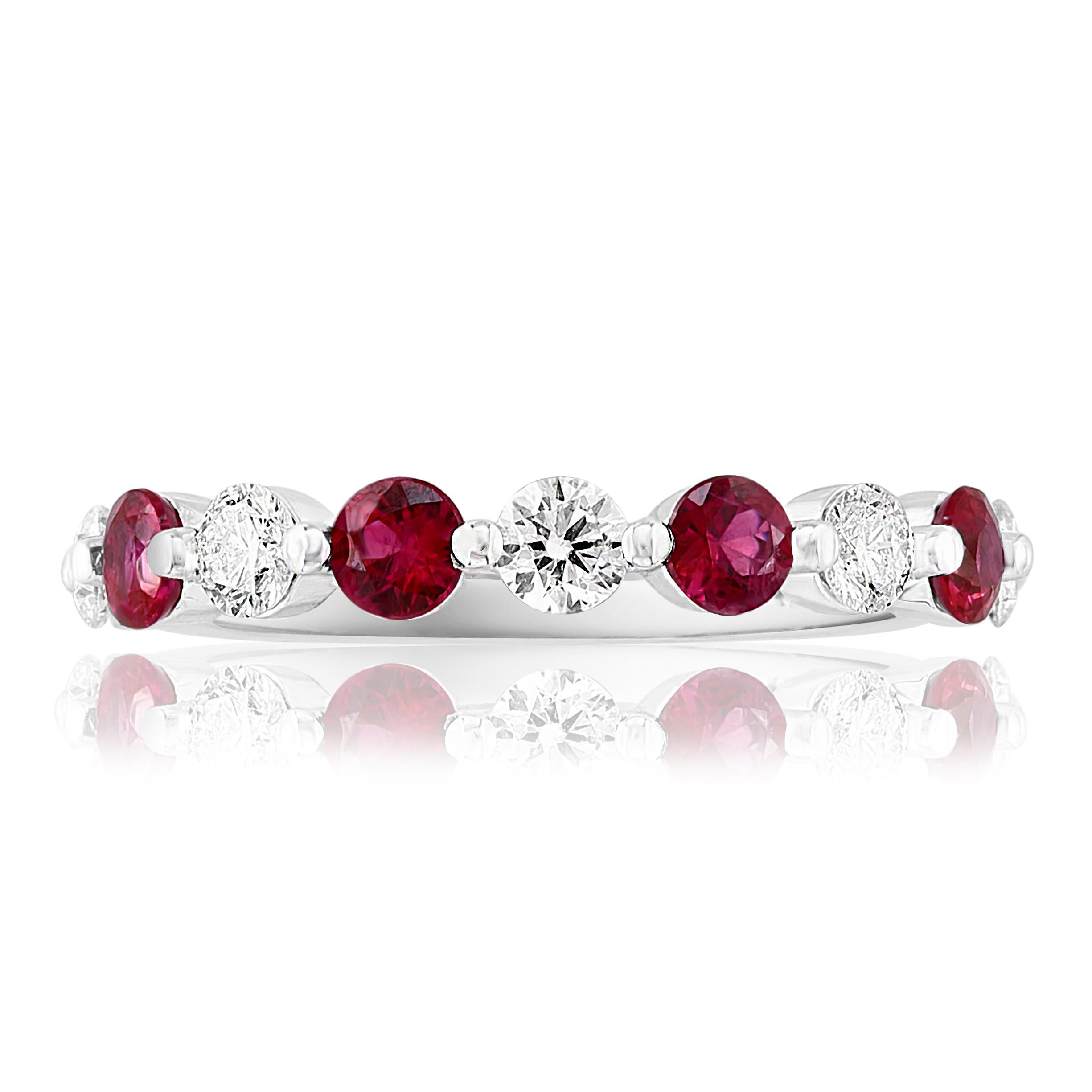 A fashionable and classic wedding band showcasing 5 brilliant cut diamonds weighing 0.50 carats total alternating with 4 round rubies weighing 0.62 carats. Stones secured with a shared prong setting made with 14K white gold. A versatile piece that