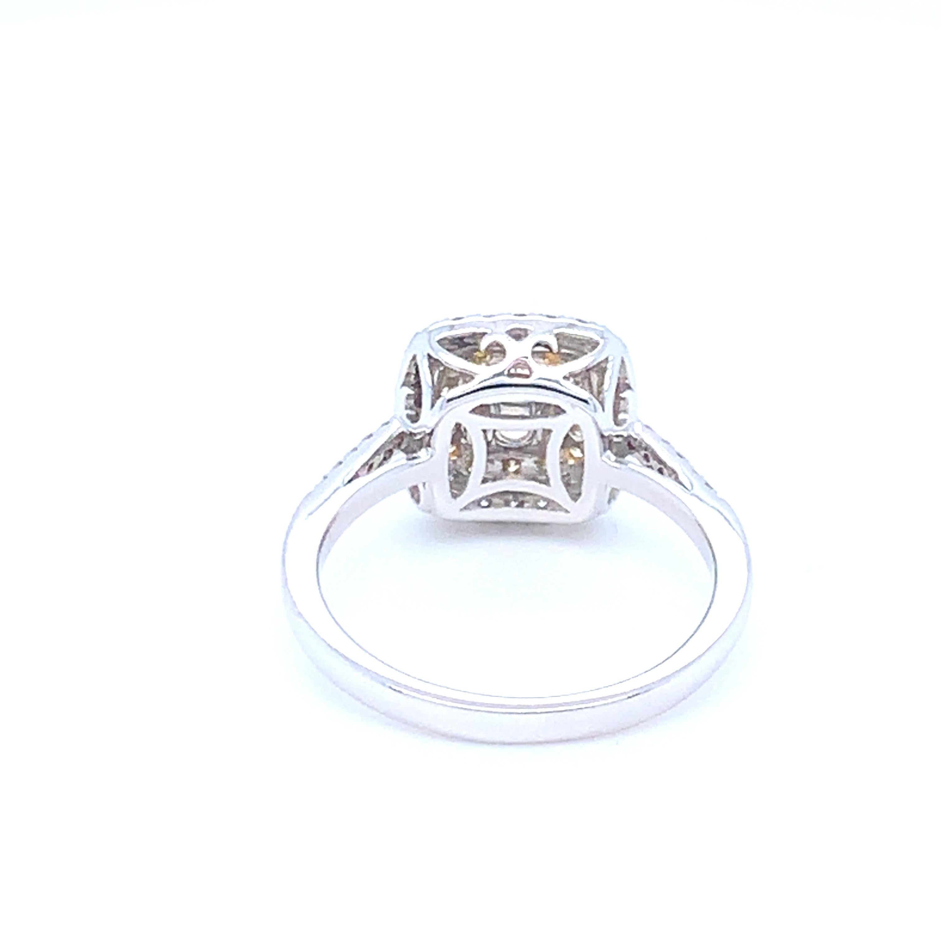 0.62 Carat Cushion Yellow Diamond White Diamond Halo Ring For Sale 5