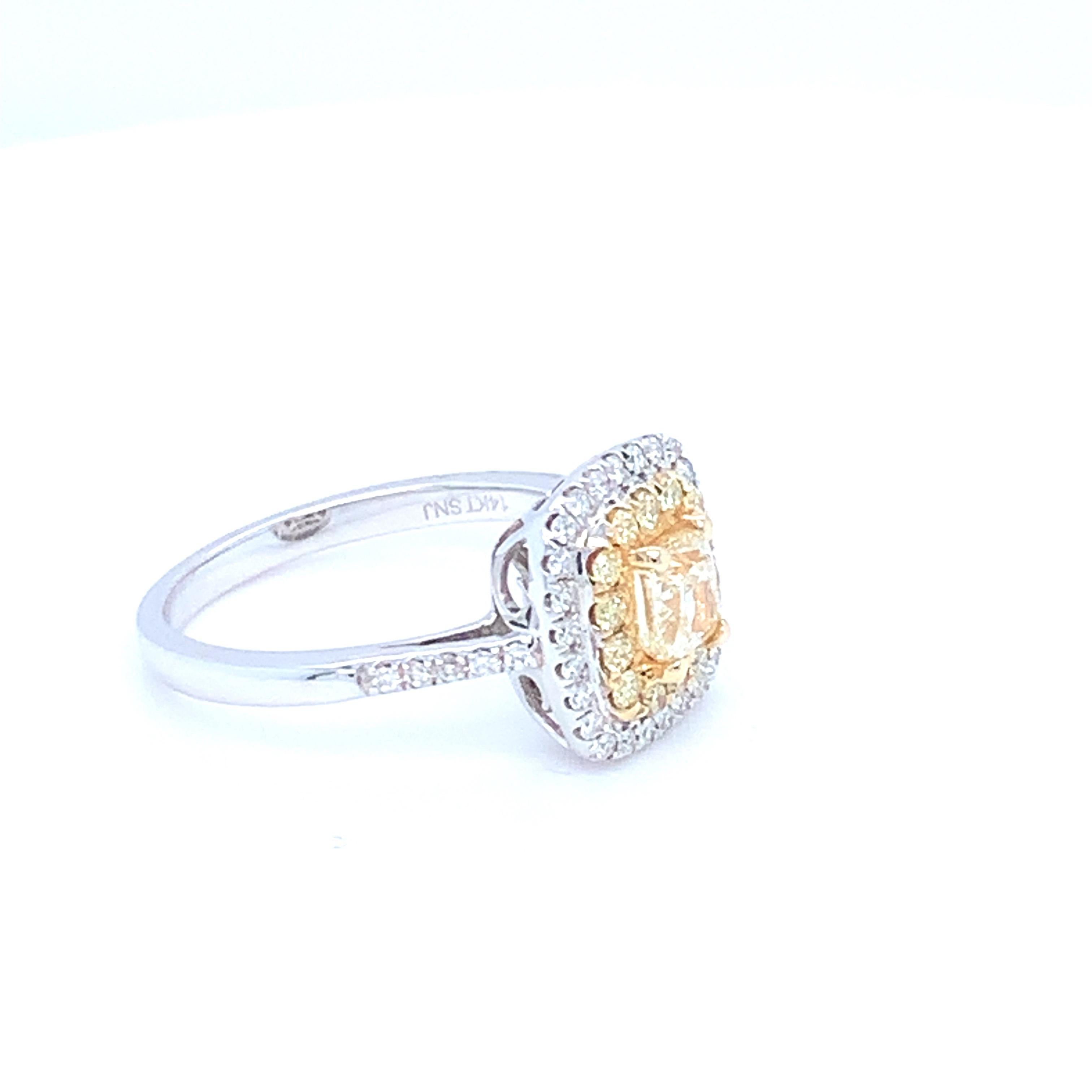 0.62 Carat Cushion Yellow Diamond White Diamond Halo Ring In New Condition For Sale In Trumbull, CT