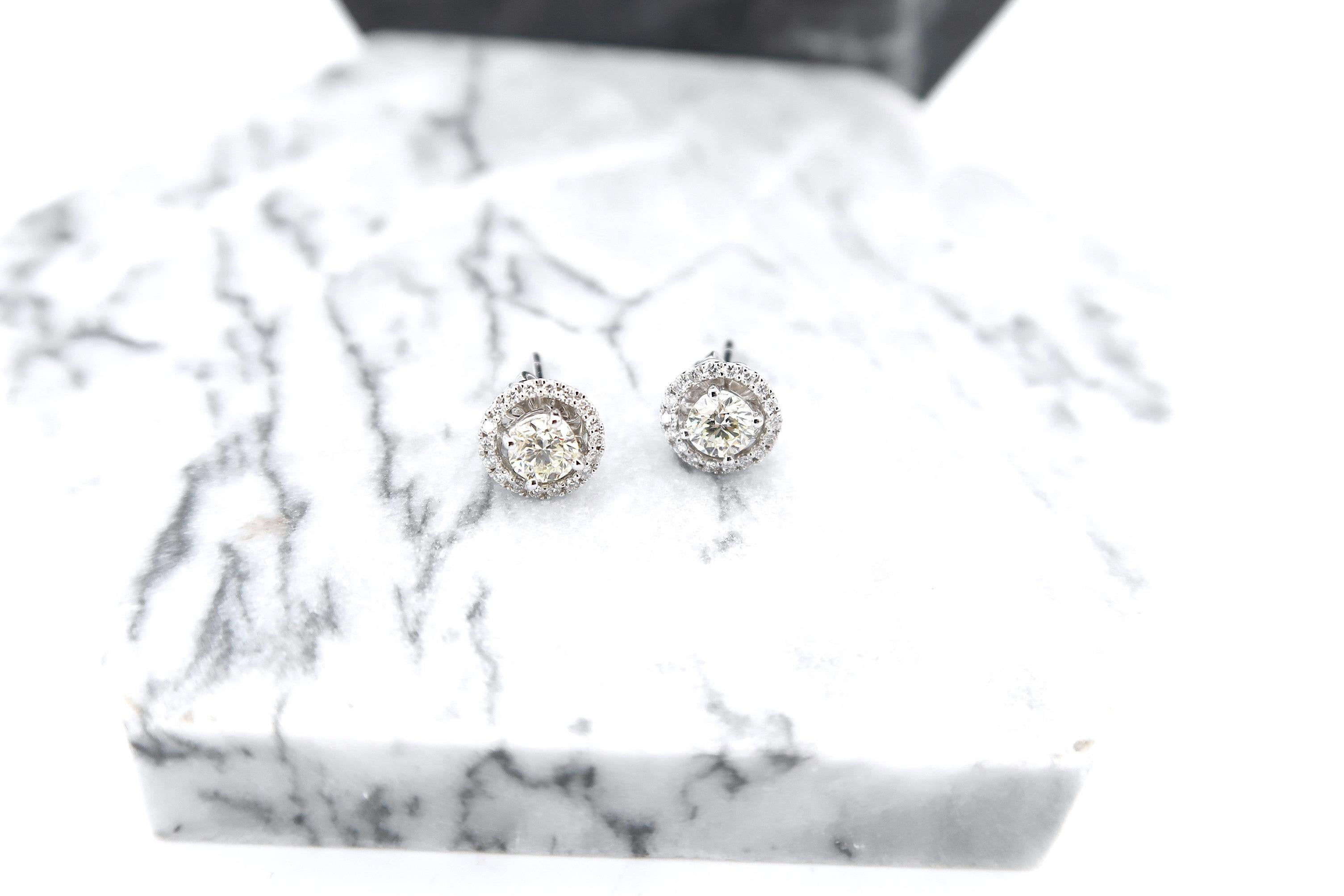 Brilliant Cut 0.62 Carat Diamond 18 Karat Gold Studs with Diamond Halo Jackets