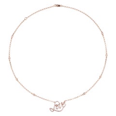 0.62 Carat Diamond 18 Karat Rose Gold Love Pendant Necklace