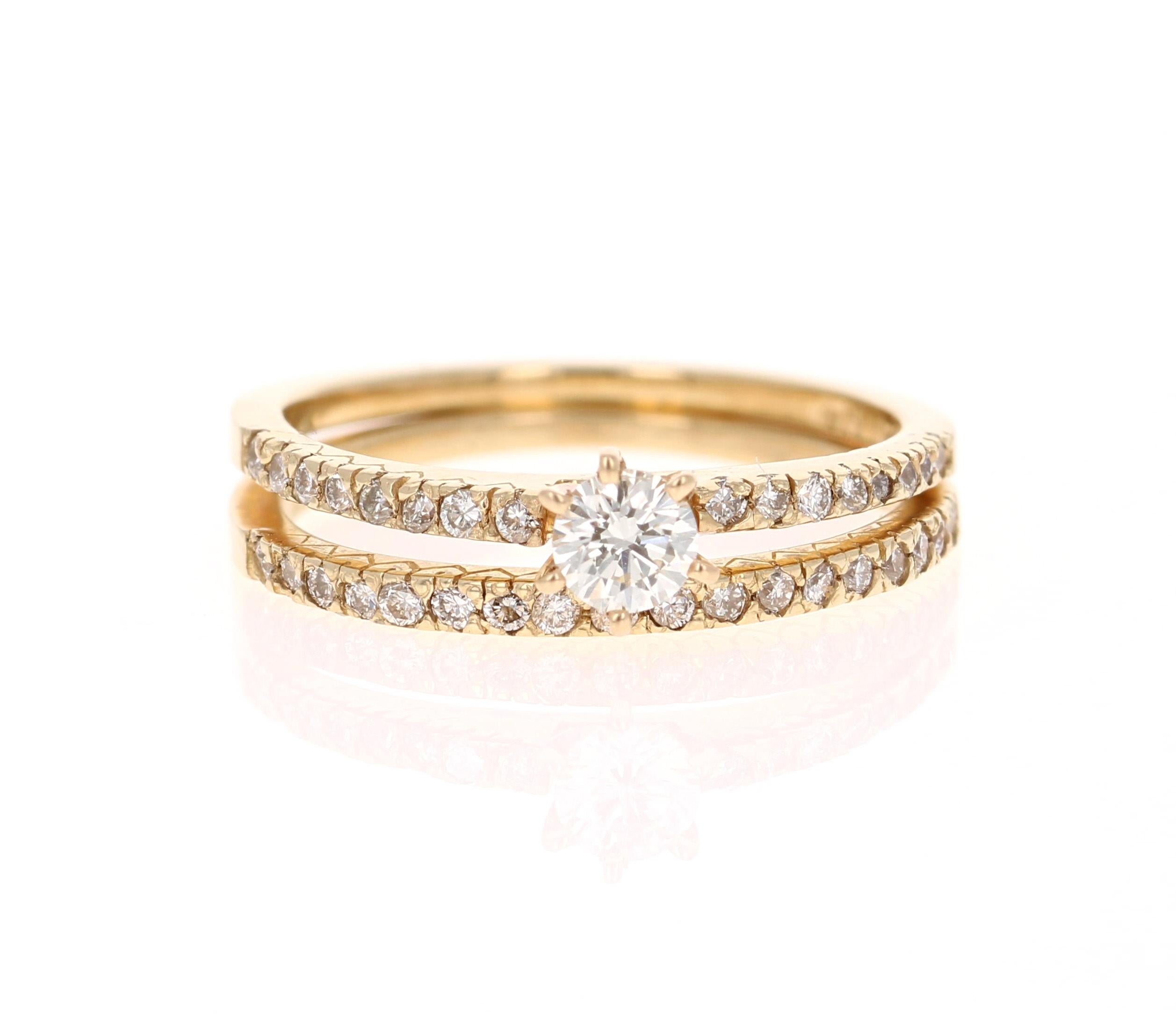 Beautiful Wedding Set in 14 Karat Yellow Gold

The center round cut diamond weighs 0.26 Carats (Clarity: SI1-, Color: H) and is surrounded by 34 round cut diamonds on the shank and on the band that weighs 0.36 Carats (Clarity: VS, Color: H) The