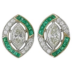 0.62 Carat Emerald And Diamond Earrings In 18 Karat White Gold