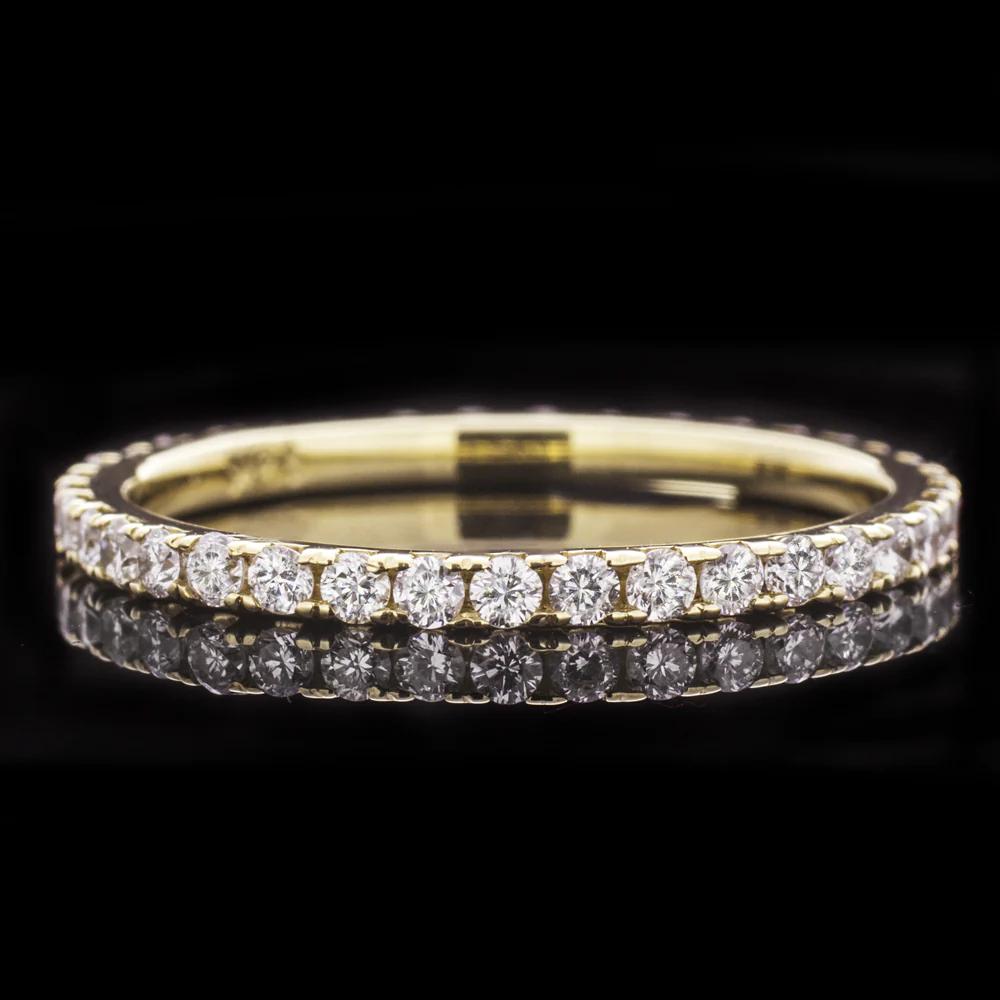 This is a diamond eternity band that is excellent in quality with 18k yellow gold, high quality diamonds and a super classic design that will stay forever in style.
It is beautiful on its own and also a great choice for a wedding band or stacking