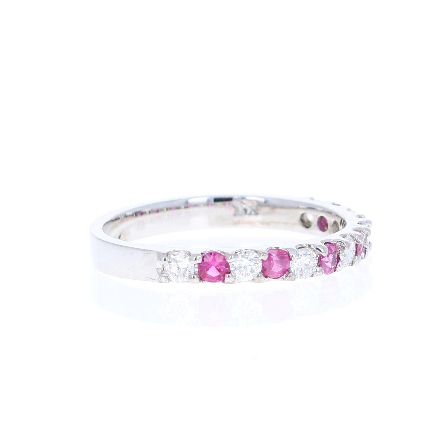 0.62 Carat Ruby and Diamond 14K White Gold Band.

This is a classic band that is a must-have!
It has 6 Rubies that weigh 0.31 Carats and 7 Round Cut Diamonds that weigh 0.31 Carats. (Clarity: SI, Color: F) The Total Carat Weight of the Band is 0.62