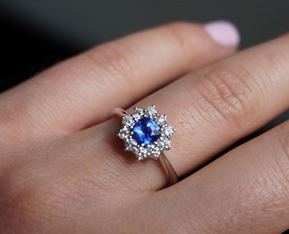 Sapphire Weight: 0.62 CT, Sapphire Measurements: 5x5 mm, Diamond Weight: 0.40 CT, Metal: 18K White Gold/3.78 gm, Ring Size: 7, Shape: Cushion, Color: Blue, Hardness: 9, Birthstone: September
