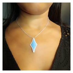 0.62 Carat Vs G Diamonds on 18 Carat White Gold Chalcedony Pendant