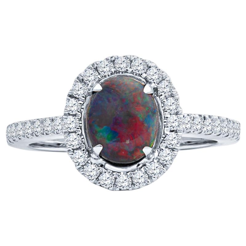 0.62ct Australian Multi-Color Opal with 0.25ctw Diamonds in 18k White Gold Ring For Sale