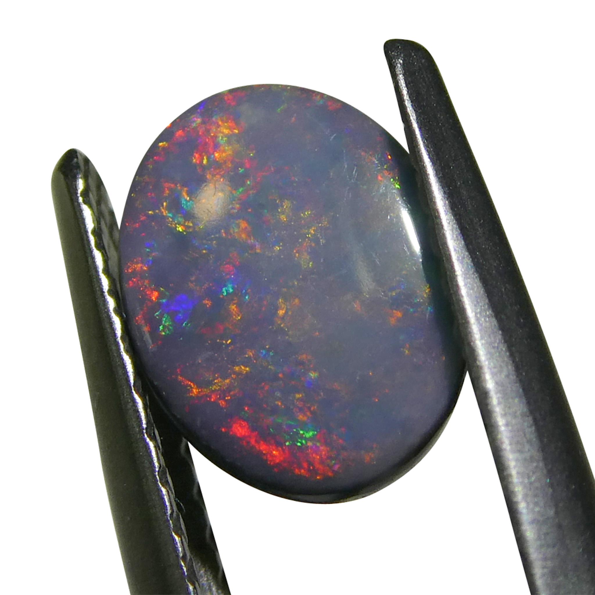 Taglio ovale 0.62ct Opale grigio ovale cabochon dall'Australia in vendita