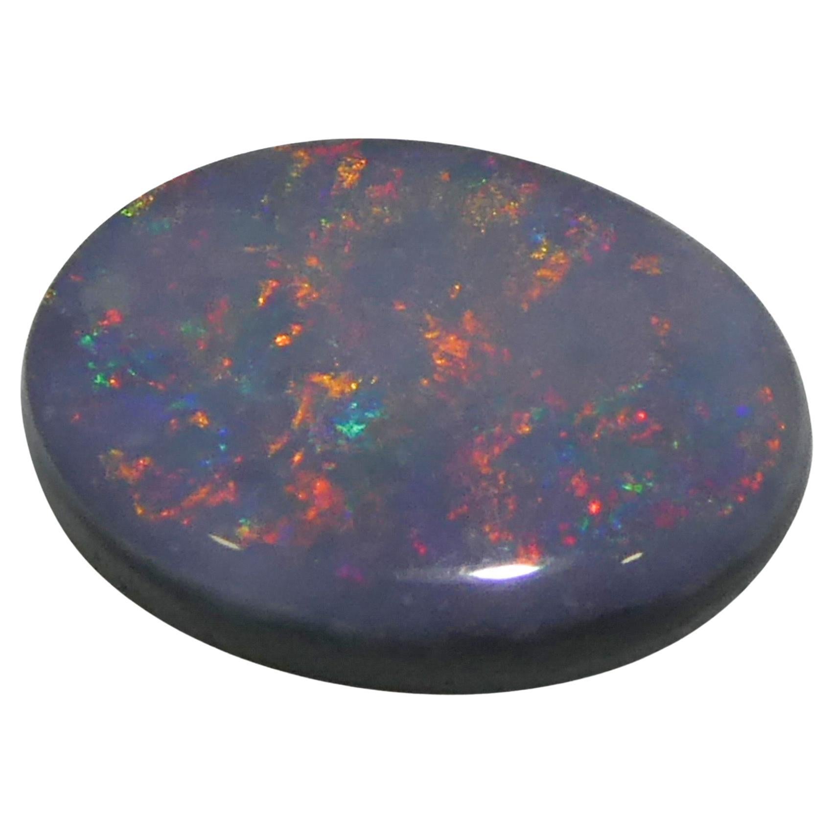 0.62ct Opale grigio ovale cabochon dall'Australia