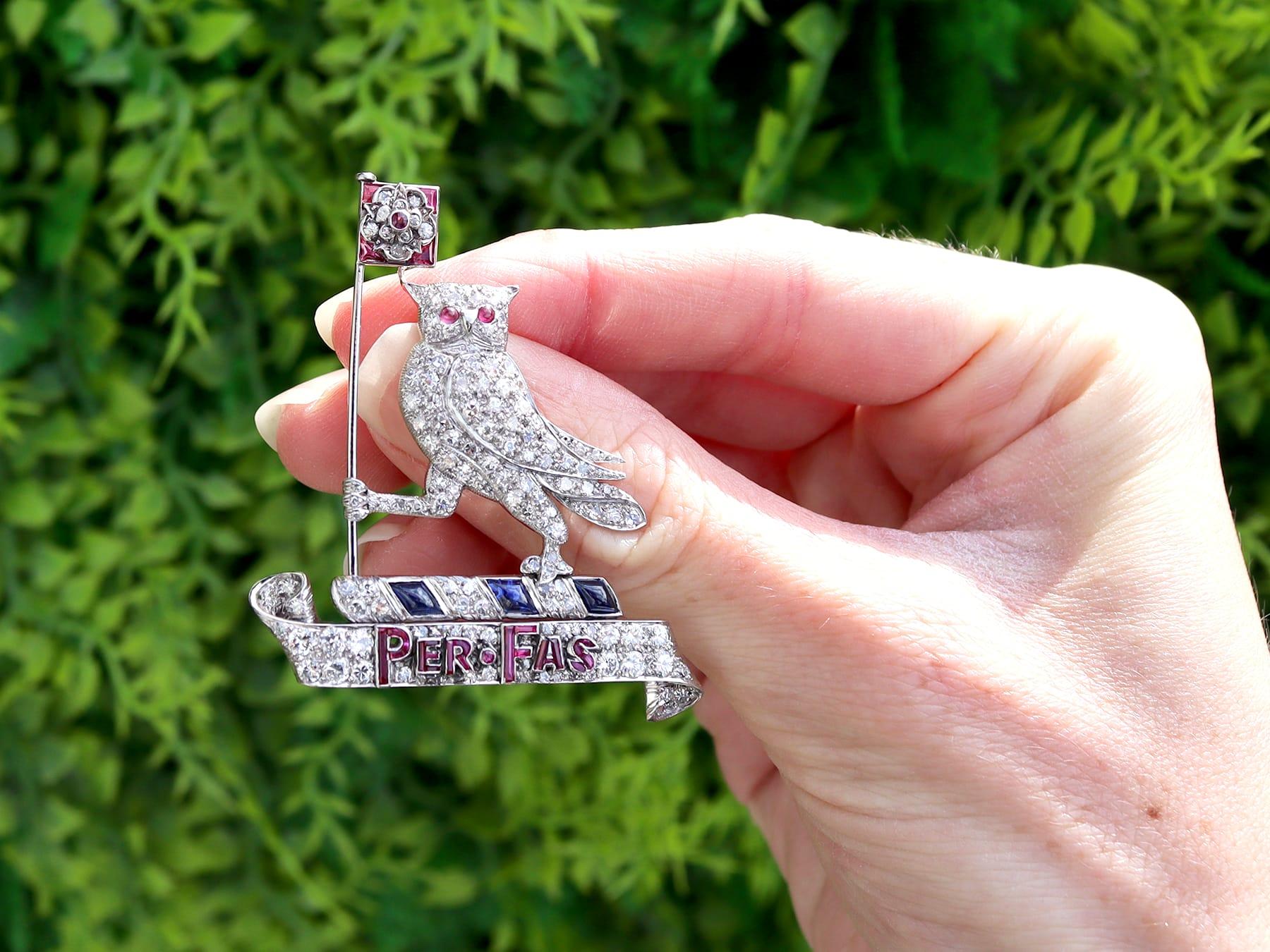 Mixed Cut 0.62Ct Ruby, 0.50Ct Sapphire and 3.15Ct Diamond, Platinum Owl Brooch Circa 1940 For Sale