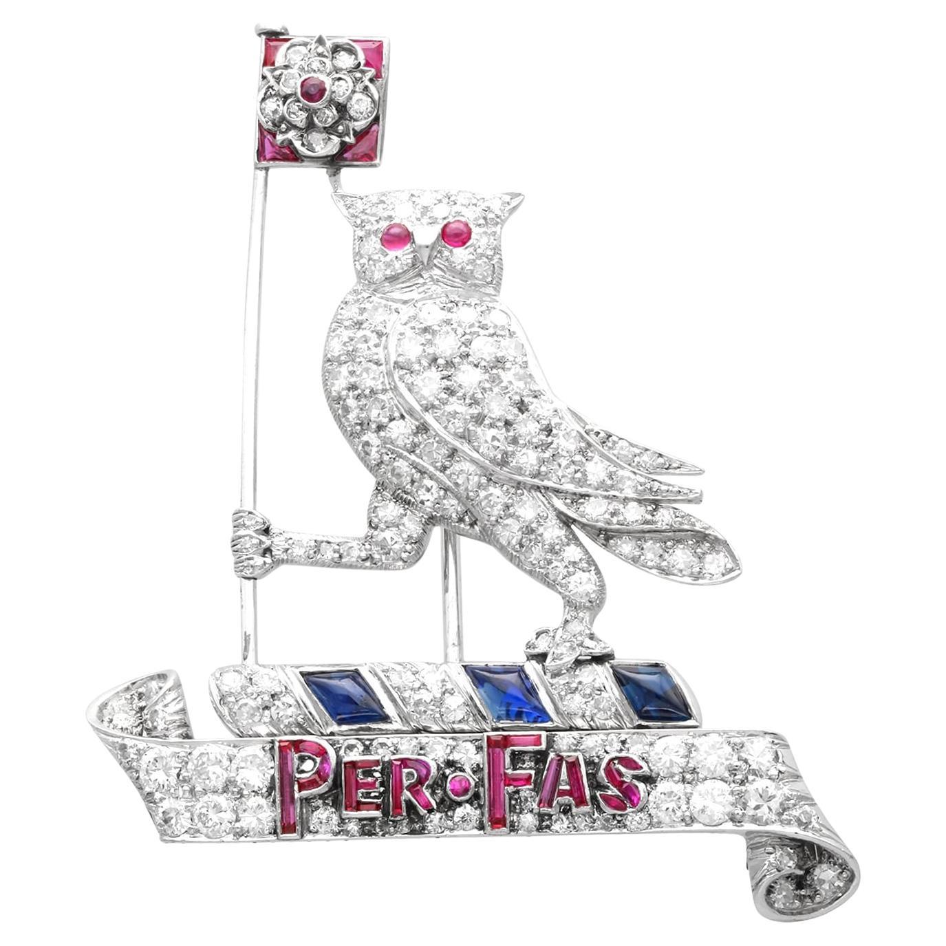 0.62Ct Ruby, 0.50Ct Sapphire and 3.15Ct Diamond, Platinum Owl Brooch Circa 1940 For Sale