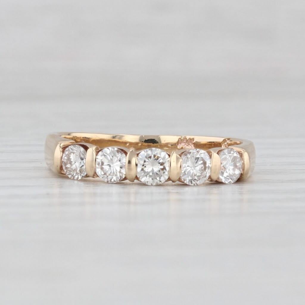 Gemstone Information:
- Natural Diamonds -
Total Carats - 0.62ctw
Cut - Round Brilliant
Color - I - J
Clarity - VS2 - SI1

Metal: 14k Yellow Gold
Weight: 2.4 Grams 
Stamps: 14k
Face Height: 3.2 mm 
Rise Above Finger: 2.5 mm
Band / Shank Width: 2.4