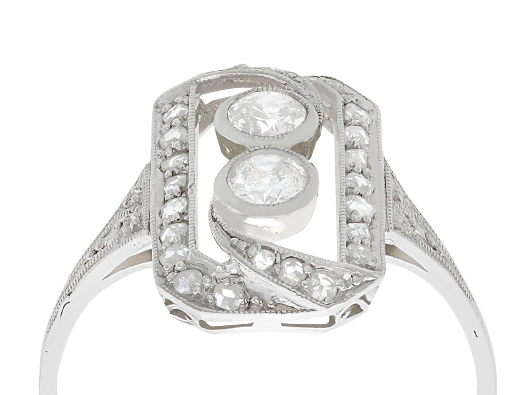 An impressive antique 0.63 carat diamond and 18 karat white gold dress ring; part of our diverse antique jewellery and estate jewelry collections.

This fine and impressive diamond cocktail ring has been crafted in 18k white gold.

The pierced