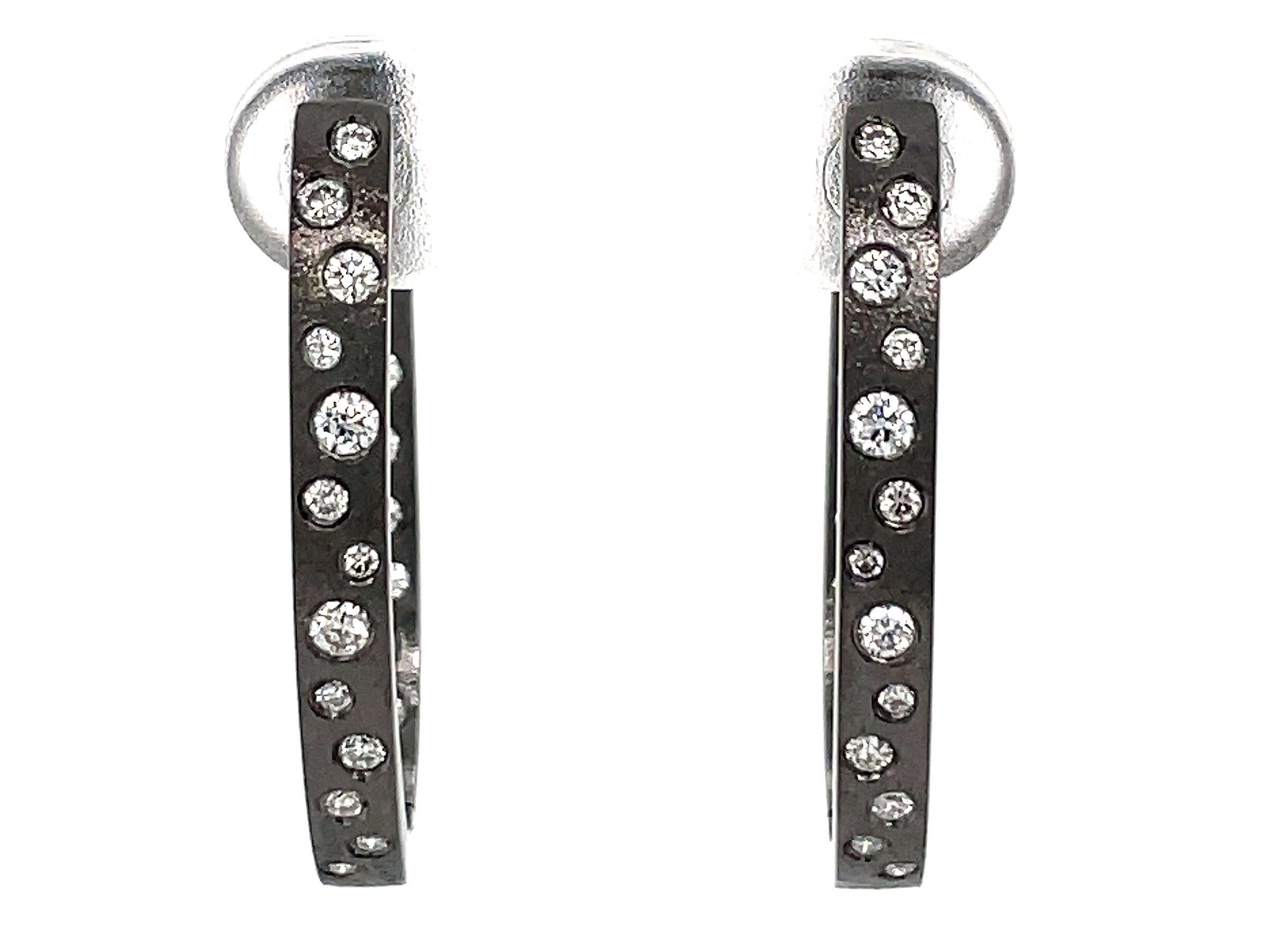 Round Cut 0.63 Carat Diamond Flush Set Oval Hoop Black Gold Earrings For Sale
