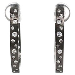 0.63 Carat Diamond Flush Set Oval Hoop Black Gold Earrings