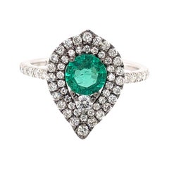 0,63 Karat Smaragd und Diamant-Ring