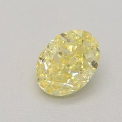 0.63 Carat Fancy Light Yellow Oval Cut Diamond VS2 Clarity GIA Certified
