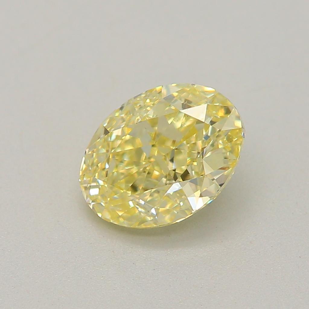 0.63 Carat Fancy Light Yellow Oval Cut Diamond VS2 Clarity GIA Certified For Sale 2