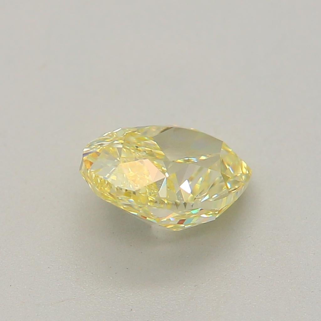 0.63 Carat Fancy Light Yellow Oval Cut Diamond VS2 Clarity GIA Certified For Sale 4