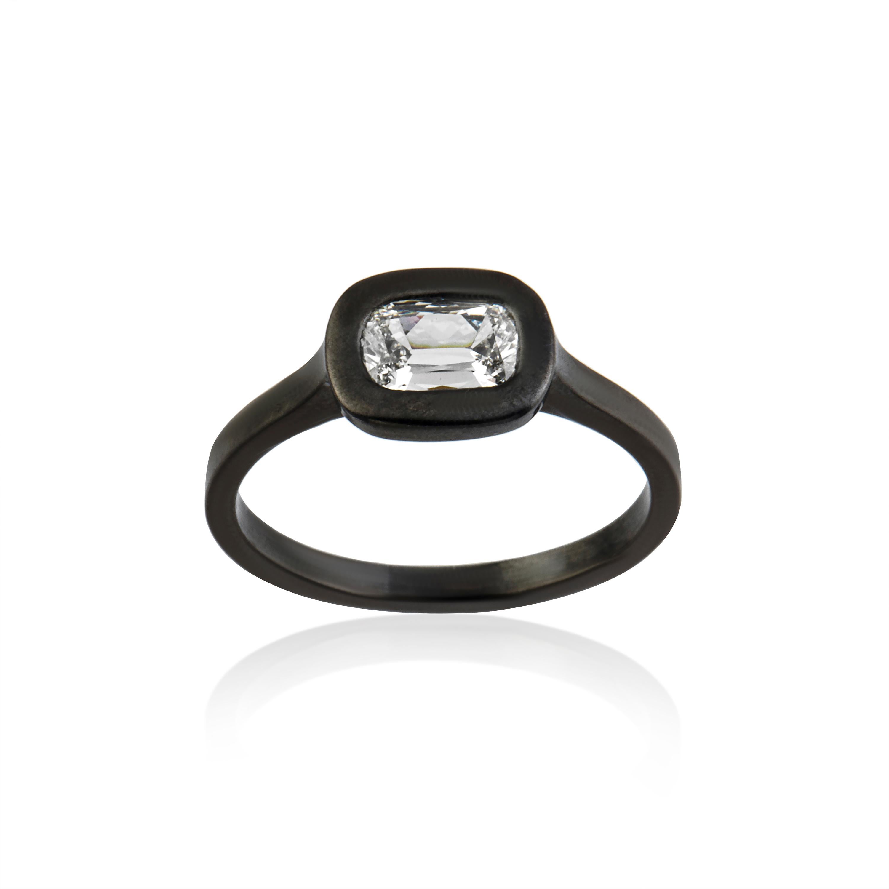This Ring Features 0.63 Carat Oldcut Cushion I - VVS2 Gia Certified Diamond Set in 3.25 Gram 18 Karat Blackened Gold.
It is Hand Crafted in Istanbul.