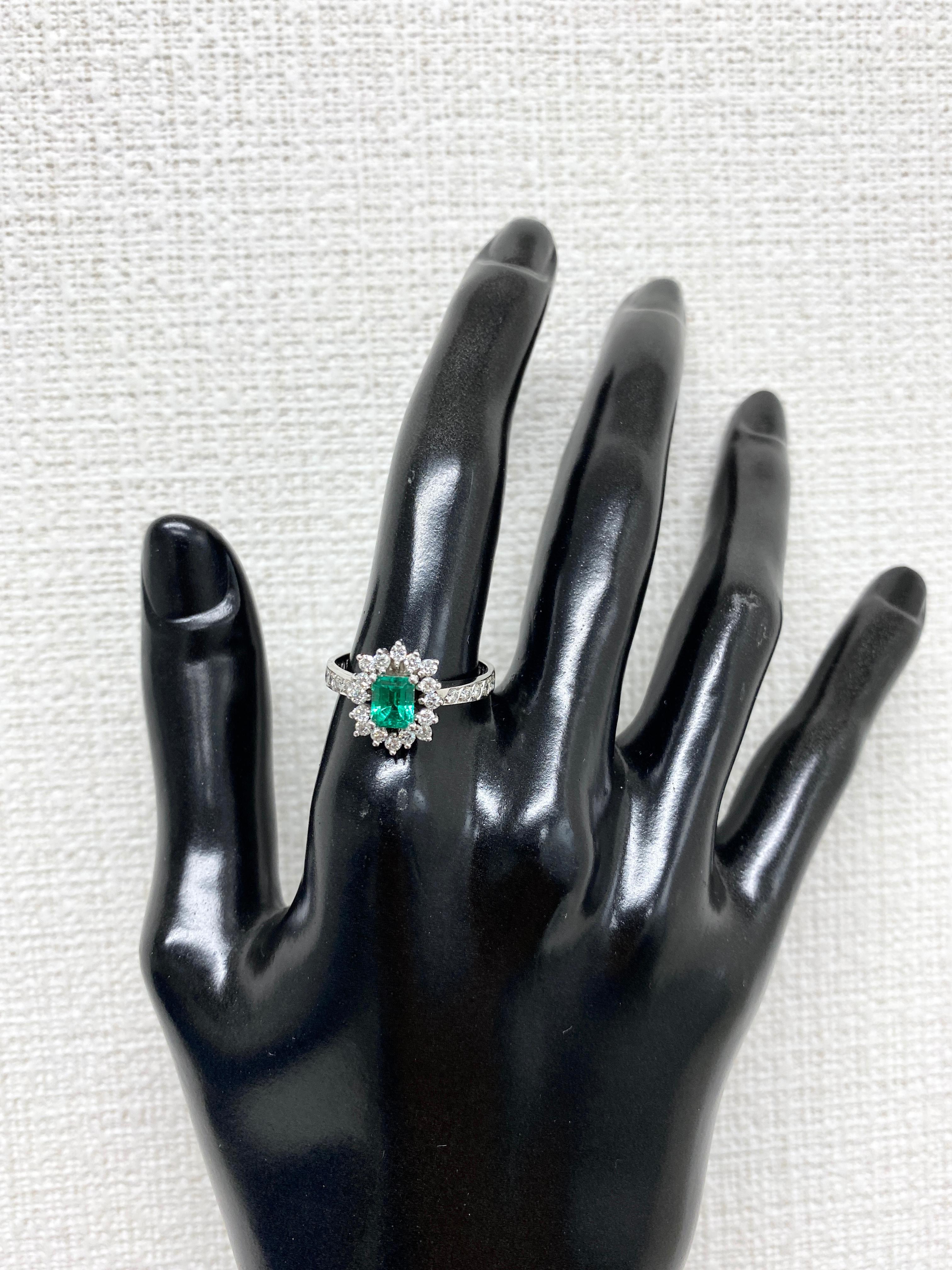 Women's 0.63 Carat Natural Emerald and Diamond Ring Set in Platinum For Sale
