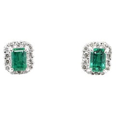 0.63 Carat Natural Emerald and Diamond Pierce Set in Platinum