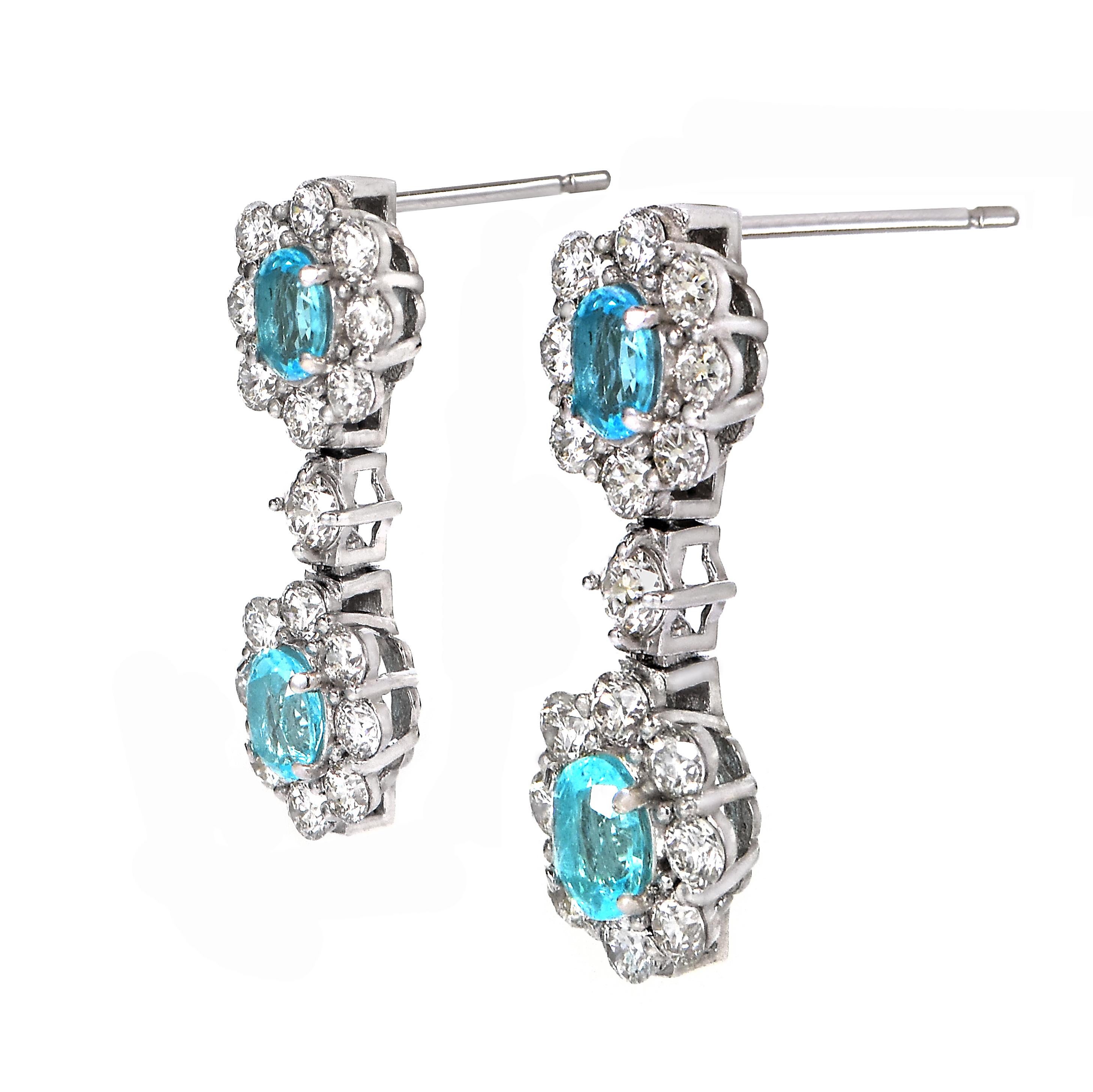 Modern 0.63 Carat Neon Blue, Brazilian Paraiba Tourmaline & Diamond Earrings For Sale