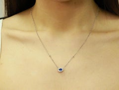 0.63 Carat Oval Cut Blue Sapphire Diamond Accents 14K White Gold Pendant