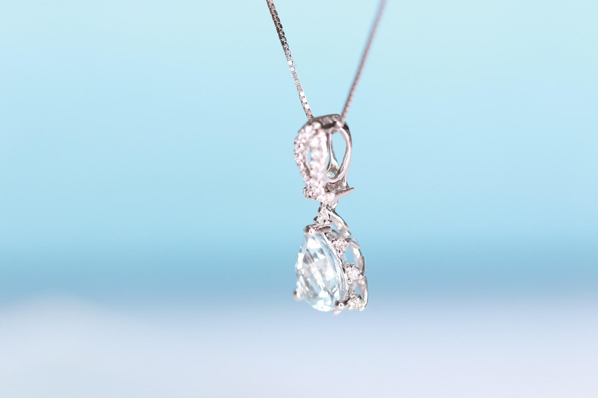 Stunning, timeless and classy eternity Unique Pendant. Decorate yourself in luxury with this Gin & Grace Pendant. The 14k White Gold jewelry boasts Pear cut Prong Setting Genuine Aquamarine (1 pcs) 0.63 Carat, along with Natural Round cut white