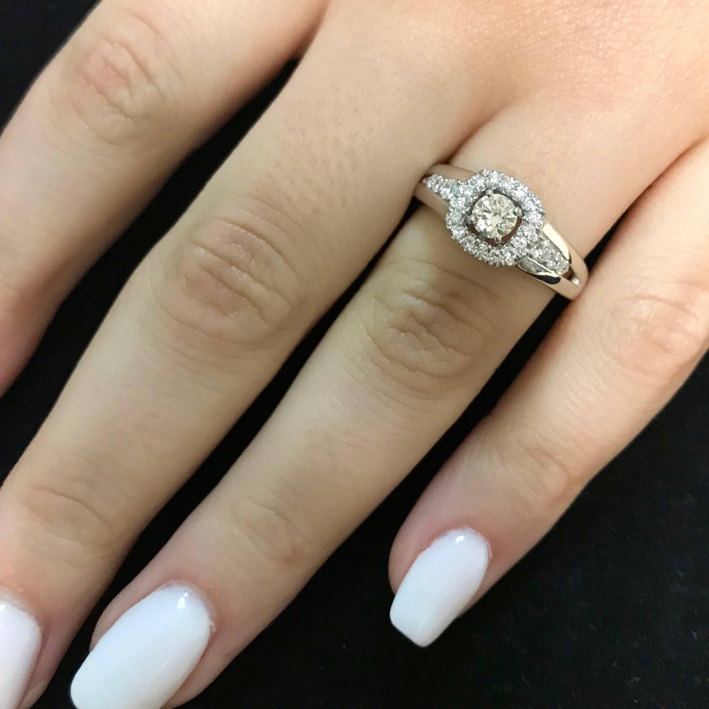Contemporary White Diamond Halo Engagement Ring