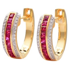 Natural Ruby  0.63 Carats set in 14K Yellow Gold Earrings with Diamonds